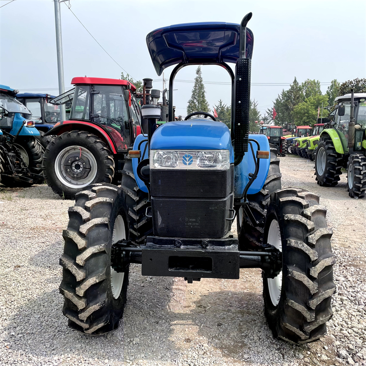 Nuevo tractor Holland SNH754 usado 4WD con sombrillas y equipos agrícolas
