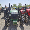 Utilizado John Deere 484 tractor con cargadores frontales